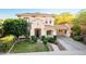 Charming two-story home featuring a terracotta roof, well-manicured lawn, and an attached two-car garage at 3683 E Nolan Dr, Chandler, AZ 85249