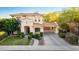 Charming two-story home featuring a terracotta roof, well-manicured lawn, and an attached two-car garage at 3683 E Nolan Dr, Chandler, AZ 85249
