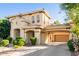 Elegant two-story residence boasting tile roofing, mature shrubbery, and a covered porte-cochère at 3683 E Nolan Dr, Chandler, AZ 85249
