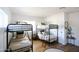 Charming bedroom featuring two sets of bunk beds, neutral decor, and a cozy rug at 4025 N 8Th Ave, Phoenix, AZ 85013