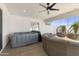 Inviting covered patio with hot tub, comfortable seating, and stylish hanging chairs offers ultimate relaxation at 4025 N 8Th Ave, Phoenix, AZ 85013