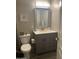Bathroom features gray vanity, white countertops, modern fixtures, and neutral paint at 4242 N 27Th St # 2, Phoenix, AZ 85016