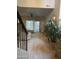 Open-concept living room with seamless indoor-outdoor flow to a private patio and comfortable seating at 4242 N 27Th St # 2, Phoenix, AZ 85016