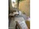 Cozy patio featuring comfortable outdoor seating with decorative pillows and a small wooden side table at 4242 N 27Th St # 2, Phoenix, AZ 85016