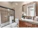 Bathroom with a glass-enclosed shower, single sink vanity, and tiled floor at 4249 E Nightingale Ln, Gilbert, AZ 85298