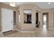 Open foyer providing a glimpse of the study and formal living areas, enhancing a sense of spaciousness at 4249 E Nightingale Ln, Gilbert, AZ 85298