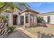 Quaint home exterior featuring a tiled roof, bay window, well-manicured shrubs, and a welcoming front door at 4249 E Nightingale Ln, Gilbert, AZ 85298