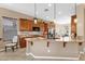 Spacious kitchen featuring granite countertops, custom cabinets, and stainless steel appliances at 4249 E Nightingale Ln, Gilbert, AZ 85298
