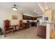 Well-lit kitchen featuring stainless steel appliances, tile floors, and ample cabinet space at 4800 N 68Th St # 270, Scottsdale, AZ 85251