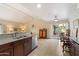 Kitchen with stainless steel appliances, granite countertops, and a view to the outdoor dining area at 4800 N 68Th St # 270, Scottsdale, AZ 85251