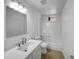 Bright bathroom features modern vanity, updated shower, and new fixtures at 492 W 17Th Ave, Apache Junction, AZ 85120