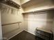 Walk-in closet with shelving and hanging rods, providing ample storage space at 4925 E Desert Cove Ave # 236, Scottsdale, AZ 85254