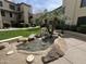 Beautiful courtyard with a charming water feature and lush greenery at 4925 E Desert Cove Ave # 236, Scottsdale, AZ 85254
