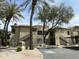 Exterior view of condo building featuring stairs leading to upper-level units at 4925 E Desert Cove Ave # 236, Scottsdale, AZ 85254