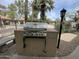 Outdoor stainless steel gas BBQ grill for resident's use in communal picnic area at 4925 E Desert Cove Ave # 236, Scottsdale, AZ 85254