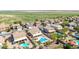 An overview of the community showcasing well-maintained homes with private pools at 565 E Rosebud Dr, San Tan Valley, AZ 85143