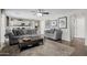 Cozy living room with plush rug, comfortable seating, and modern decor at 565 E Rosebud Dr, San Tan Valley, AZ 85143
