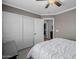 Bedroom showcasing a large closet and an ensuite bathroom, offering comfort and convenience at 565 E Rosebud Dr, San Tan Valley, AZ 85143