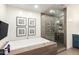 Modern bathroom features a soaking tub, glass shower, and decorative wall art at 5960 E Orange Blossom Ln, Phoenix, AZ 85018