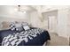 Bright bedroom with a modern bed, stylish decor, and ample natural light at 5960 E Orange Blossom Ln, Phoenix, AZ 85018