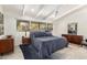 Main bedroom featuring neutral colors, natural light, and a ceiling fan at 5960 E Orange Blossom Ln, Phoenix, AZ 85018
