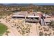 Aerial view of the clubhouse featuring desert landscaping and community amenities at 6522 E Night Glow Cir, Scottsdale, AZ 85266