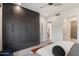 Stylish bedroom featuring a large built-in wardrobe, mountain views and neutral decor at 6522 E Night Glow Cir, Scottsdale, AZ 85266