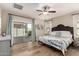 Serene main bedroom features a private patio access and a spacious layout at 690 W Mangrove Rd, Queen Creek, AZ 85140