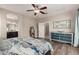 The main bedroom offers neutral colors, ample space, and includes an ensuite bathroom at 690 W Mangrove Rd, Queen Creek, AZ 85140