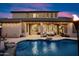 Backyard pool and patio showcasing a perfect outdoor space for relaxation and entertainment at 7238 W El Cortez Pl, Peoria, AZ 85383