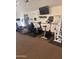 Community fitness center featuring treadmills, elliptical machines, and free weights at 8260 E Arabian Trl # 275, Scottsdale, AZ 85258