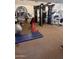 Community fitness center featuring treadmills, elliptical machines, and free weights at 8260 E Arabian Trl # 275, Scottsdale, AZ 85258