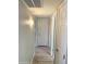 Neutral hallway with updated flooring and lighting at 8260 E Arabian Trl # 275, Scottsdale, AZ 85258