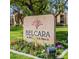 Belcara at McCormick Ranch sign surrounded by flower beds and trees at 8260 E Arabian Trl # 275, Scottsdale, AZ 85258