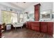 Bright bathroom featuring wood look tile, soaking tub, and large vanity at 844 W Sherri Dr, Gilbert, AZ 85233