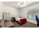 Bedroom featuring carpet floors, ceiling fan, natural light, and furniture at 844 W Sherri Dr, Gilbert, AZ 85233