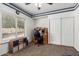 Bedroom with a window, closet, and desk area, complemented by carpet flooring for a comfortable atmosphere at 844 W Sherri Dr, Gilbert, AZ 85233