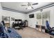 Customized bedroom with sports team decor, a desk area, and carpet flooring for a personalized touch at 844 W Sherri Dr, Gilbert, AZ 85233