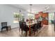 Bright kitchen and dining area with a large island and modern appliances at 844 W Sherri Dr, Gilbert, AZ 85233