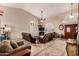 Large living room featuring high ceilings, ceiling fans, and tiled floors at 844 W Sherri Dr, Gilbert, AZ 85233