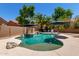 Private pool with lush landscaping, a tanning ledge, and plenty of space for lounge chairs and umbrellas at 844 W Sherri Dr, Gilbert, AZ 85233