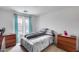 Bedroom featuring cool-toned accents, neutral carpet and a comfortable bed at 9364 W Cordes Rd, Tolleson, AZ 85353