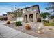 Attractive two-story home featuring a well-kept gravel yard and desert landscaping at 9364 W Cordes Rd, Tolleson, AZ 85353