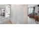Bright hallway leading to bedrooms showcasing neutral decor and plenty of natural light at 9364 W Cordes Rd, Tolleson, AZ 85353