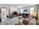 Spacious living room with tile floors and comfortable seating at 9364 W Cordes Rd, Tolleson, AZ 85353
