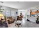 Spacious living room seamlessly connects to the kitchen and dining area at 9364 W Cordes Rd, Tolleson, AZ 85353