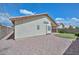 This home boasts an easy-to-maintain backyard with gravel, turf, and a privacy fence at 9837 W Tonopah Dr, Peoria, AZ 85382