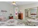 Bright bedroom boasts a walk-in closet, ensuite, and ample natural light at 9837 W Tonopah Dr, Peoria, AZ 85382