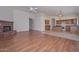Spacious open floor plan with brick fireplace, oak kitchen, and lots of natural light at 9837 W Tonopah Dr, Peoria, AZ 85382