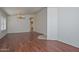 Expansive living room showcasing wood floors and an open layout at 9837 W Tonopah Dr, Peoria, AZ 85382